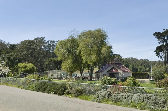 a view of a building with sitting area