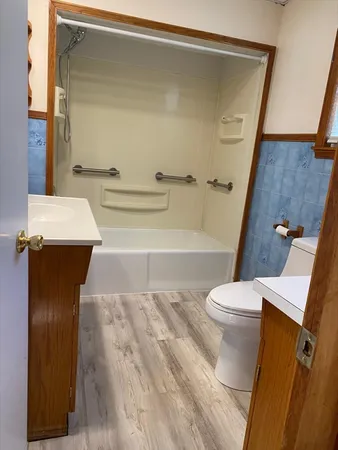 a bathroom with a sink and a toilet