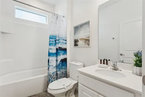 a view of a house with backyard porch and garden