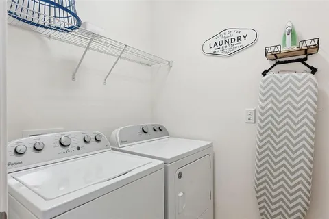 a aerial view of a house with a yard