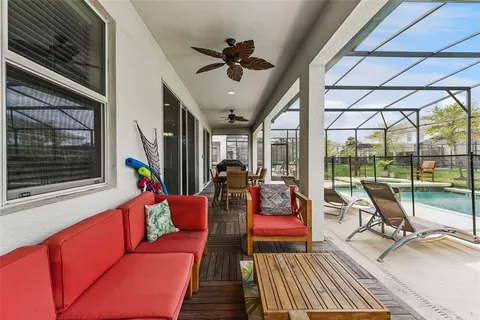 an aerial view of a house with garden space and street view