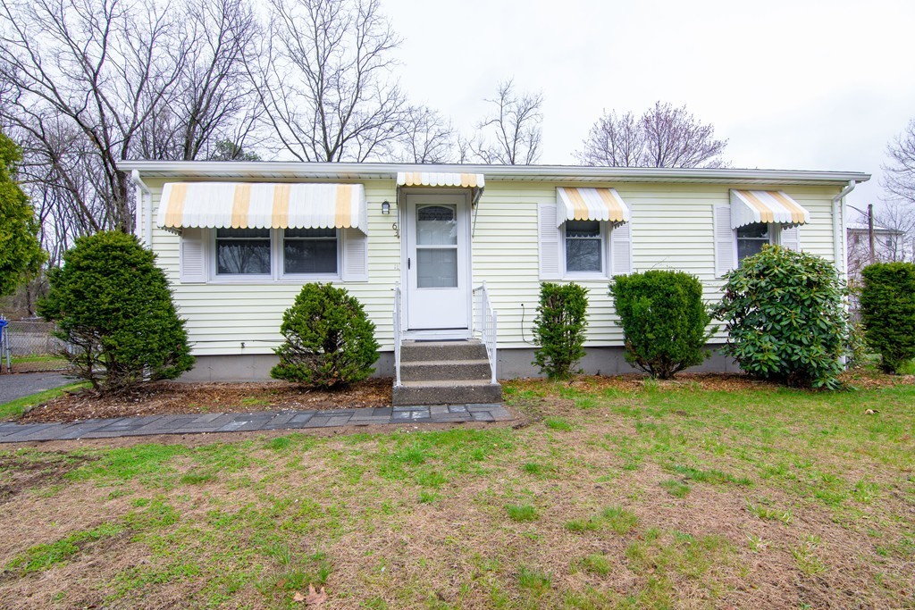 front view of a house with a yard
