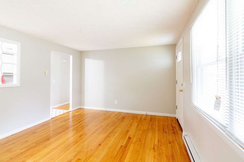 63 Finch Road Springfield, MA 01119 - Photo 7 of 18 a view of empty room with wooden floor