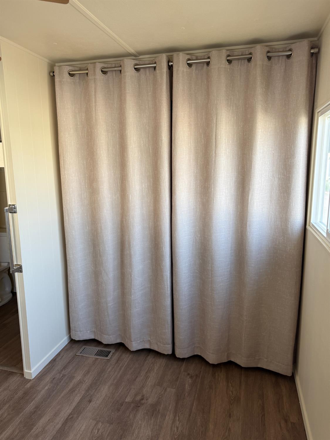 2107 Patterson Road, Unit 31 Riverbank, CA 95367 - Photo 22 of 34 a view of a walk in closet with wooden floor