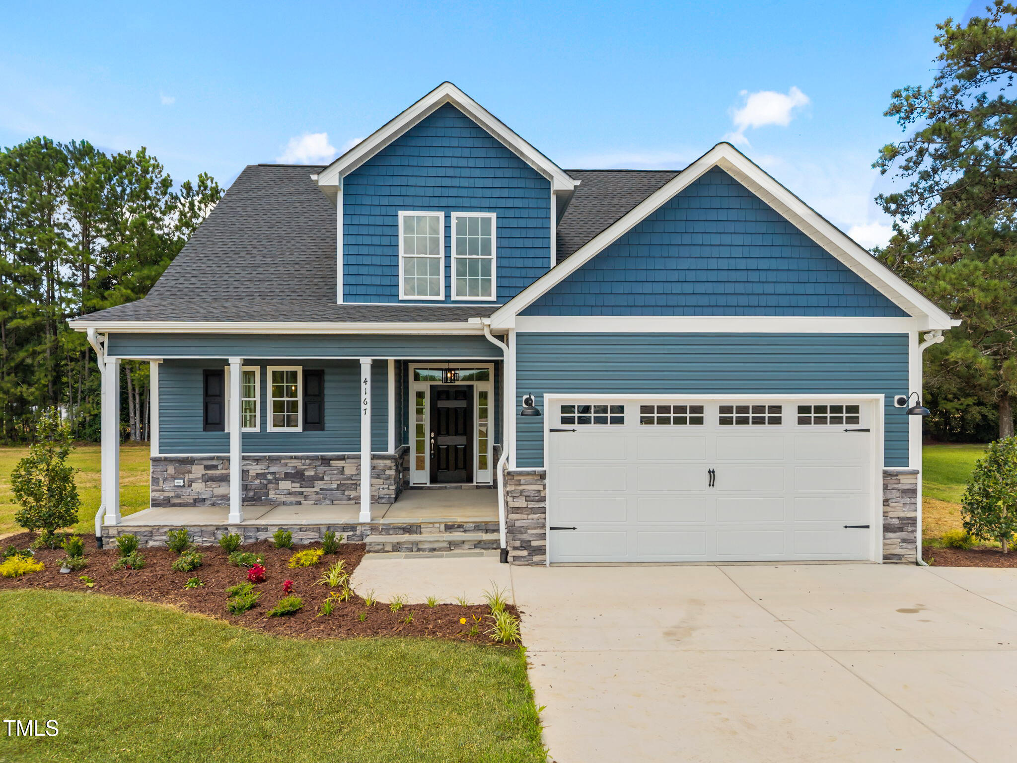 front view of a house with a yard