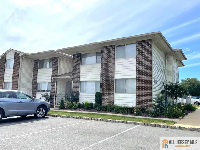 a car parked in front of a house