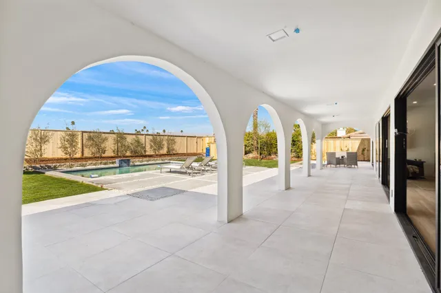 a view of lobby with open kitchen