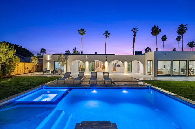 a view of a house with a swimming pool