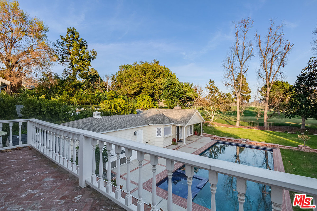 20 Toluca Estates Drive Toluca Lake, CA 91602 - Photo 9 of 46 a view of a balcony with two chairs and a table