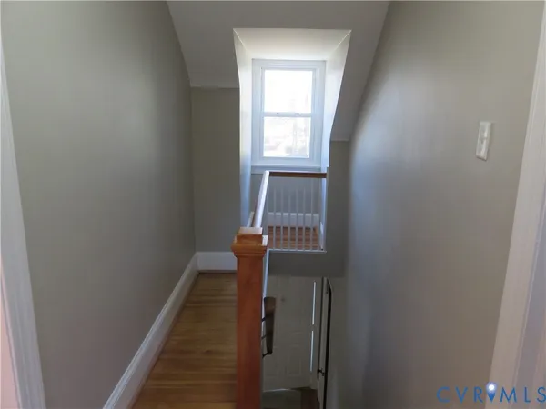 a stair with table and mirror