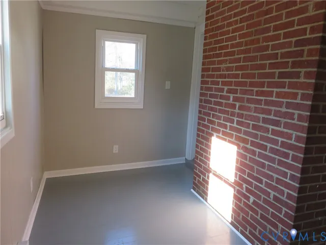 a view of an empty room and window