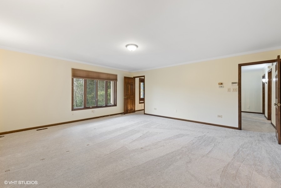 6318 Martin Drive Willowbrook, IL 60527 - Photo 15 of 33 an empty room with windows and closet
