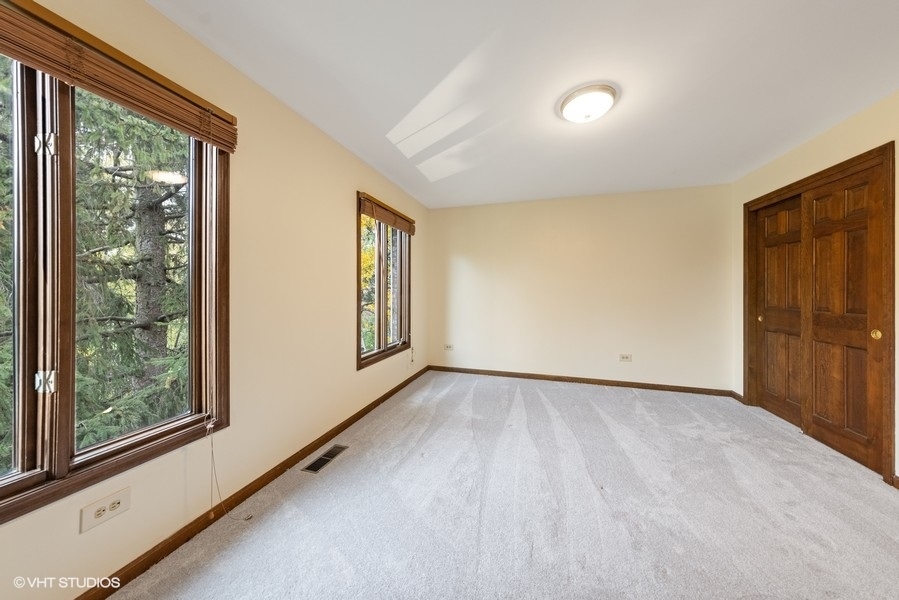6318 Martin Drive Willowbrook, IL 60527 - Photo 19 of 33 a view of an empty room and window
