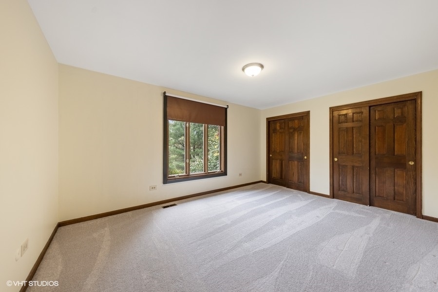 6318 Martin Drive Willowbrook, IL 60527 - Photo 20 of 33 a view of an empty room with windows and closet