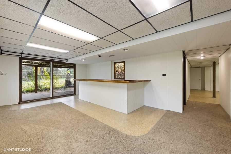 6318 Martin Drive Willowbrook, IL 60527 - Photo 2 of 33 a view of an empty room with a window