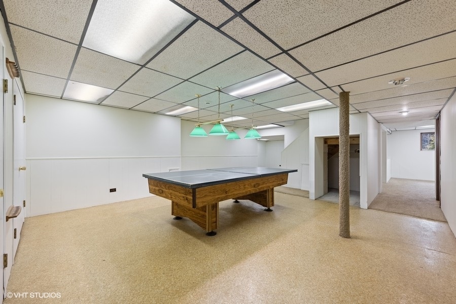 6318 Martin Drive Willowbrook, IL 60527 - Photo 29 of 33 a room with pool table and wooden floor