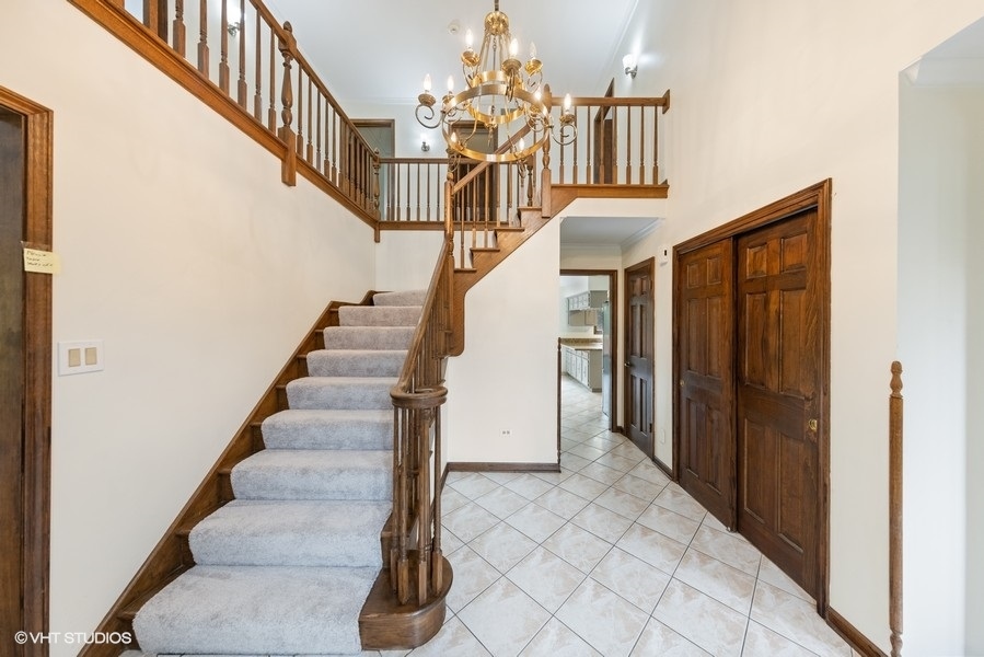 6318 Martin Drive Willowbrook, IL 60527 - Photo 4 of 33 a view of entryway and hall with wooden floor
