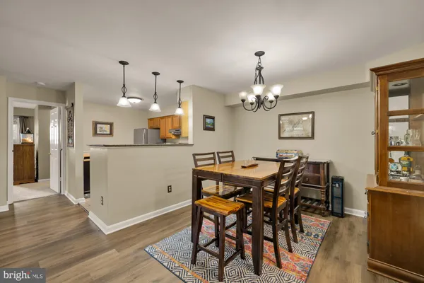 a view of a dining room with furniture and window