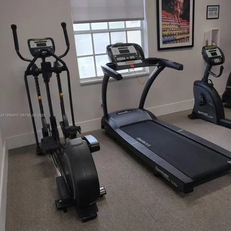 a view of a room with gym equipment