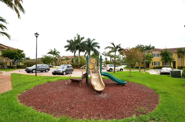 a view of a park with slide