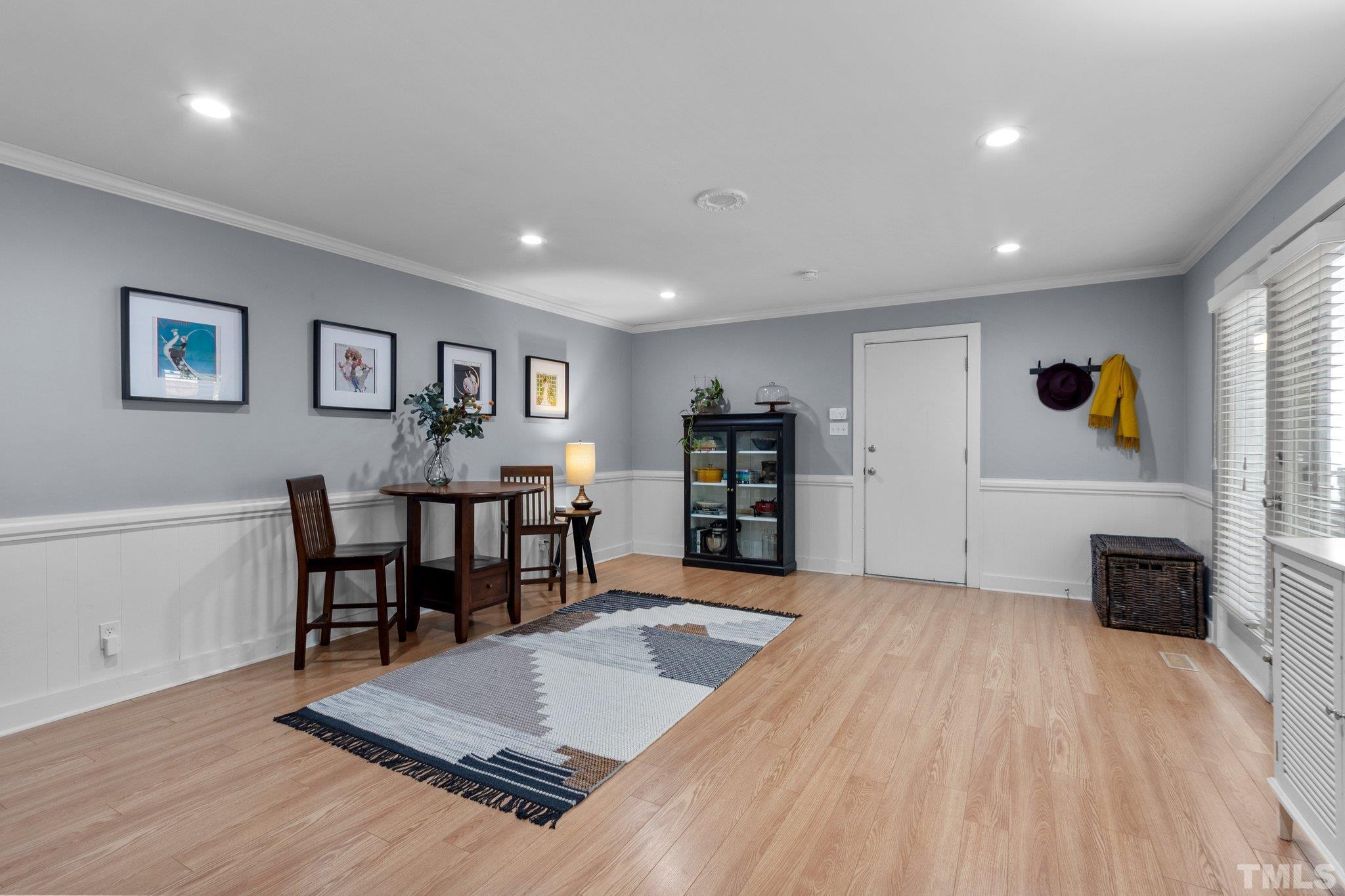 5 St James Court Durham, NC 27713 - Photo 16 of 44 a living room with furniture and a wooden floor