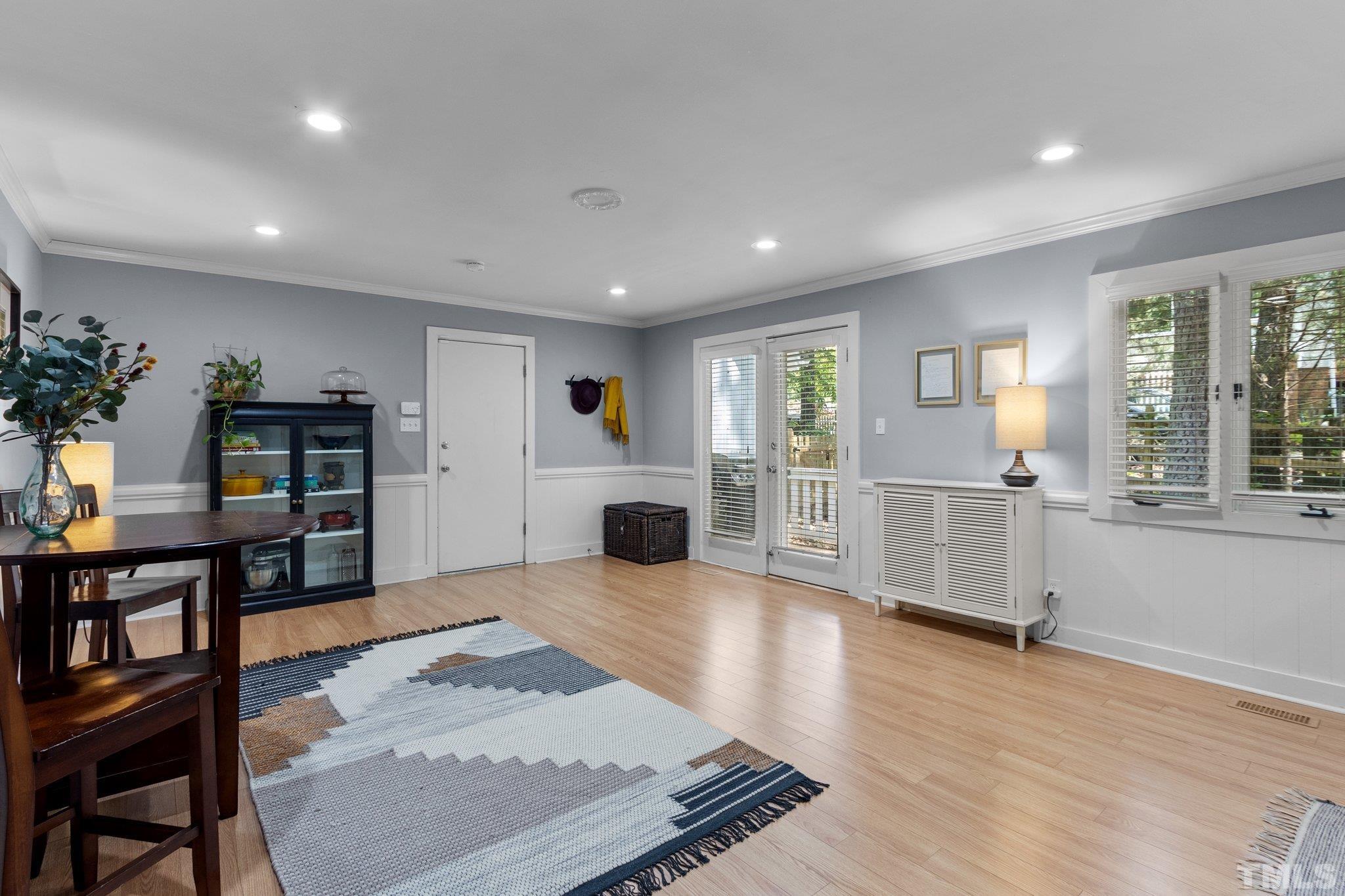 5 St James Court Durham, NC 27713 - Photo 17 of 44 a view of a kitchen with furniture and wooden floor