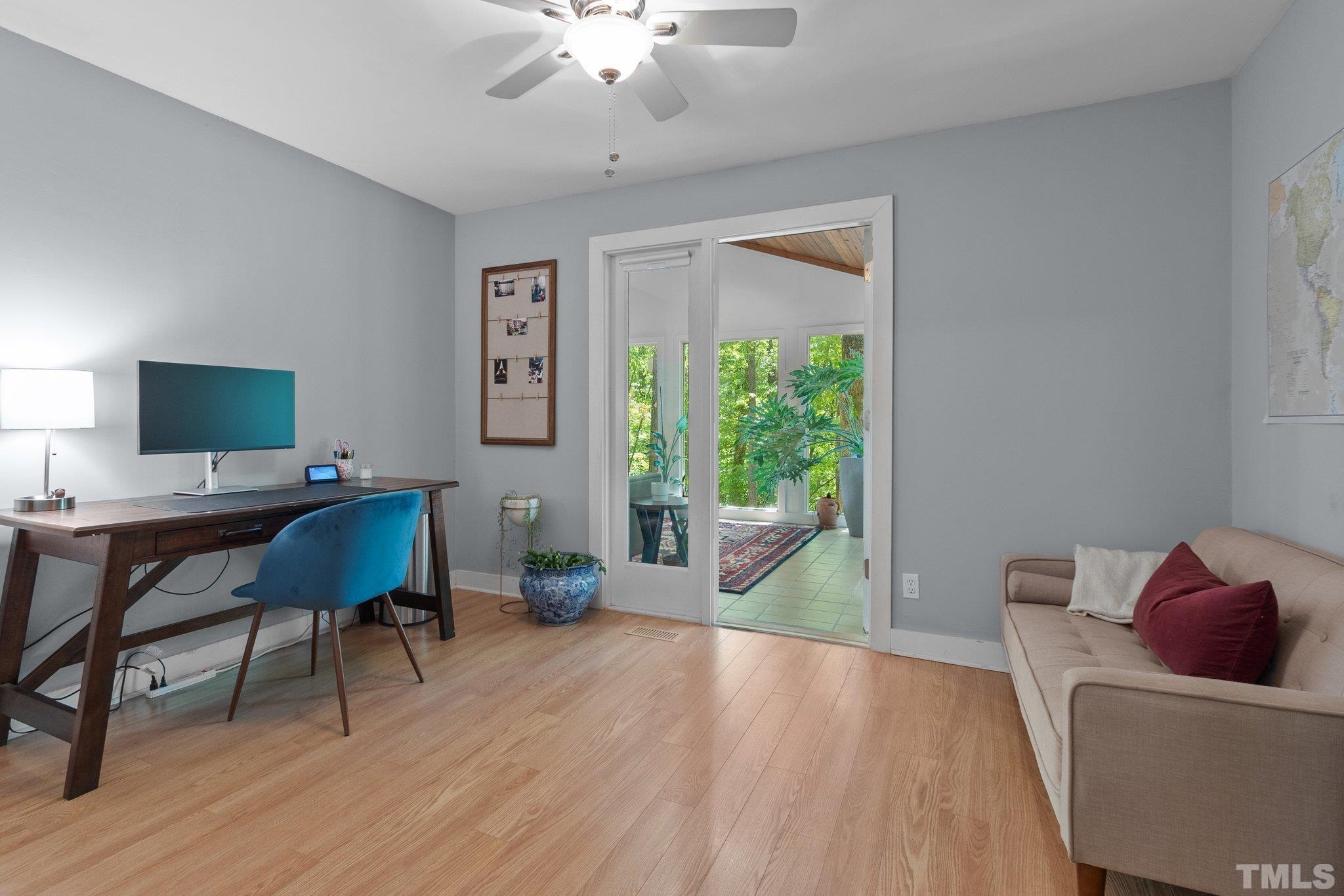 5 St James Court Durham, NC 27713 - Photo 25 of 44 a living room with furniture and a wooden floor