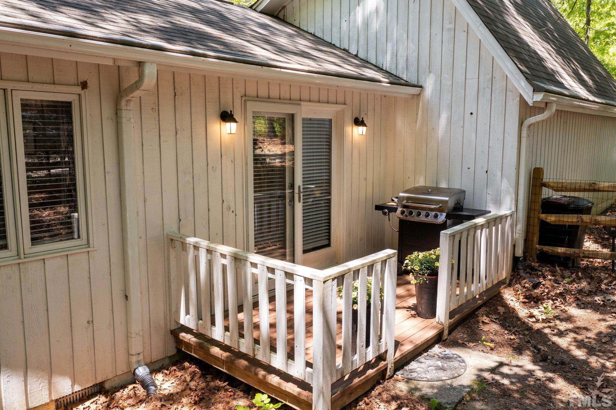 5 St James Court Durham, NC 27713 - Photo 31 of 44 a view of a porch with wooden fence and stairs
