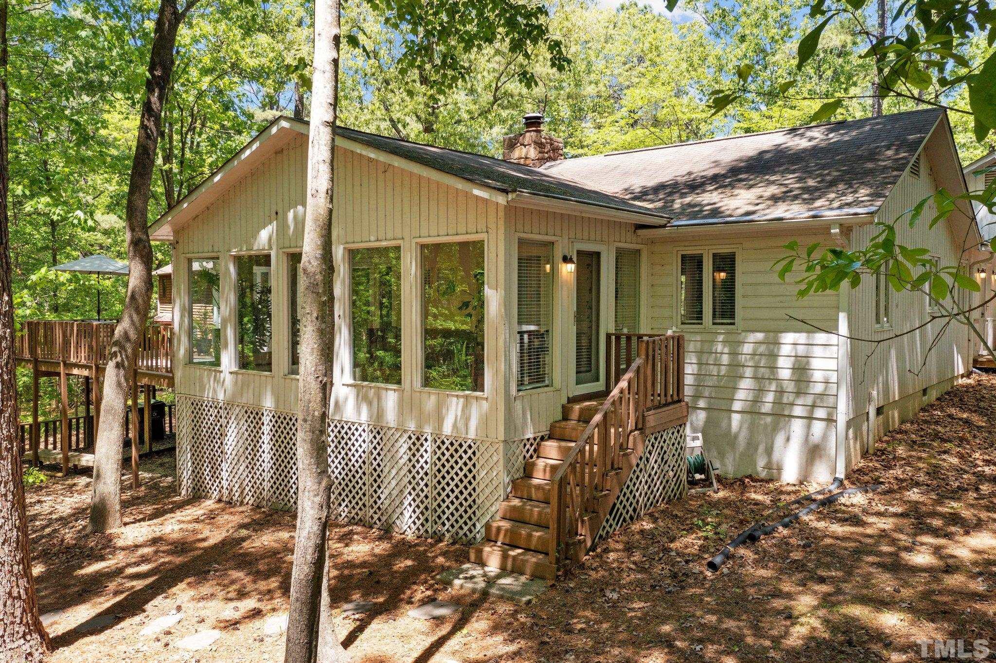 5 St James Court Durham, NC 27713 - Photo 34 of 44 a front view of a house with a porch