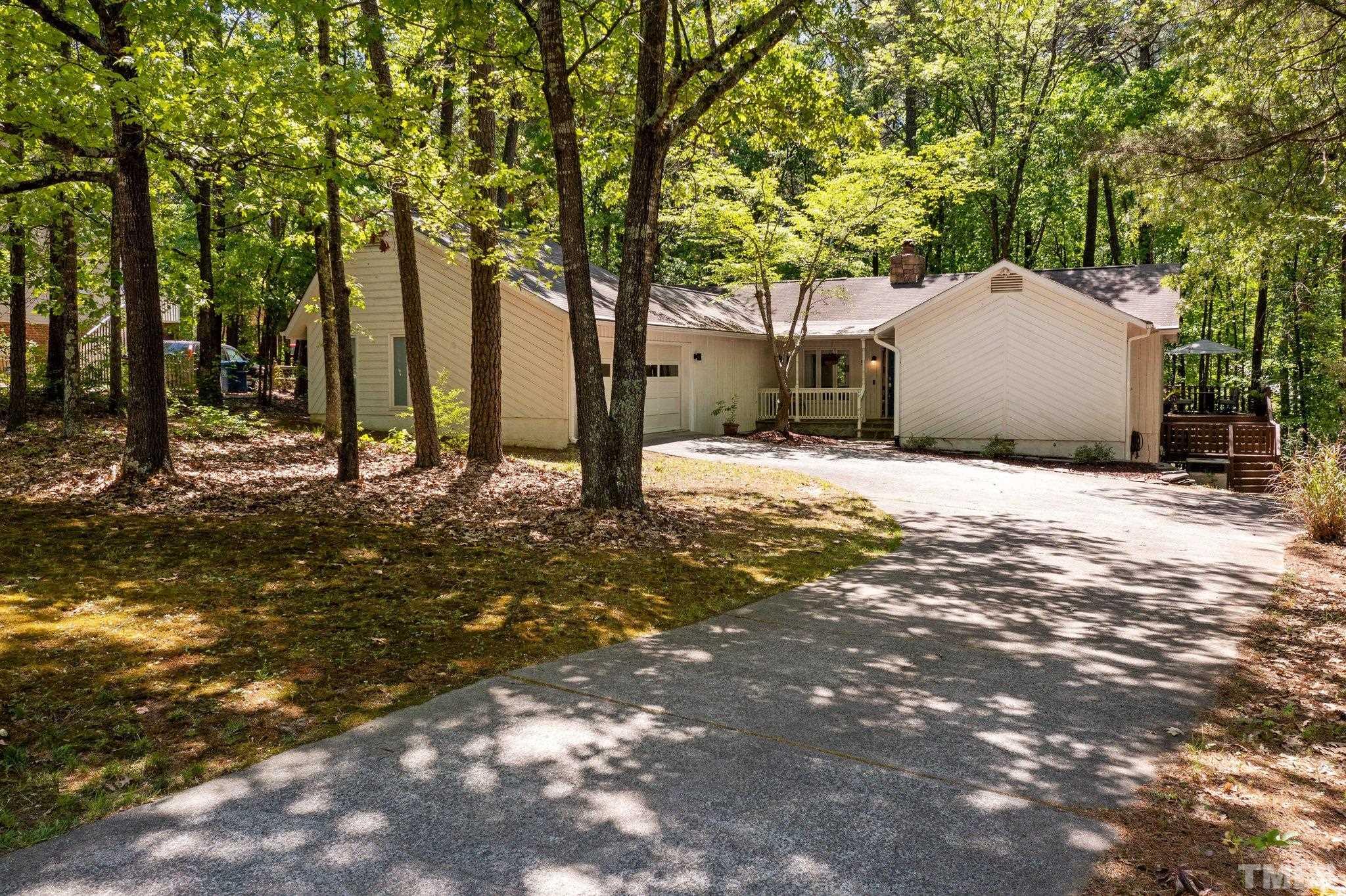 5 St James Court Durham, NC 27713 - Photo 43 of 44 a view of a house with a tree and a yard