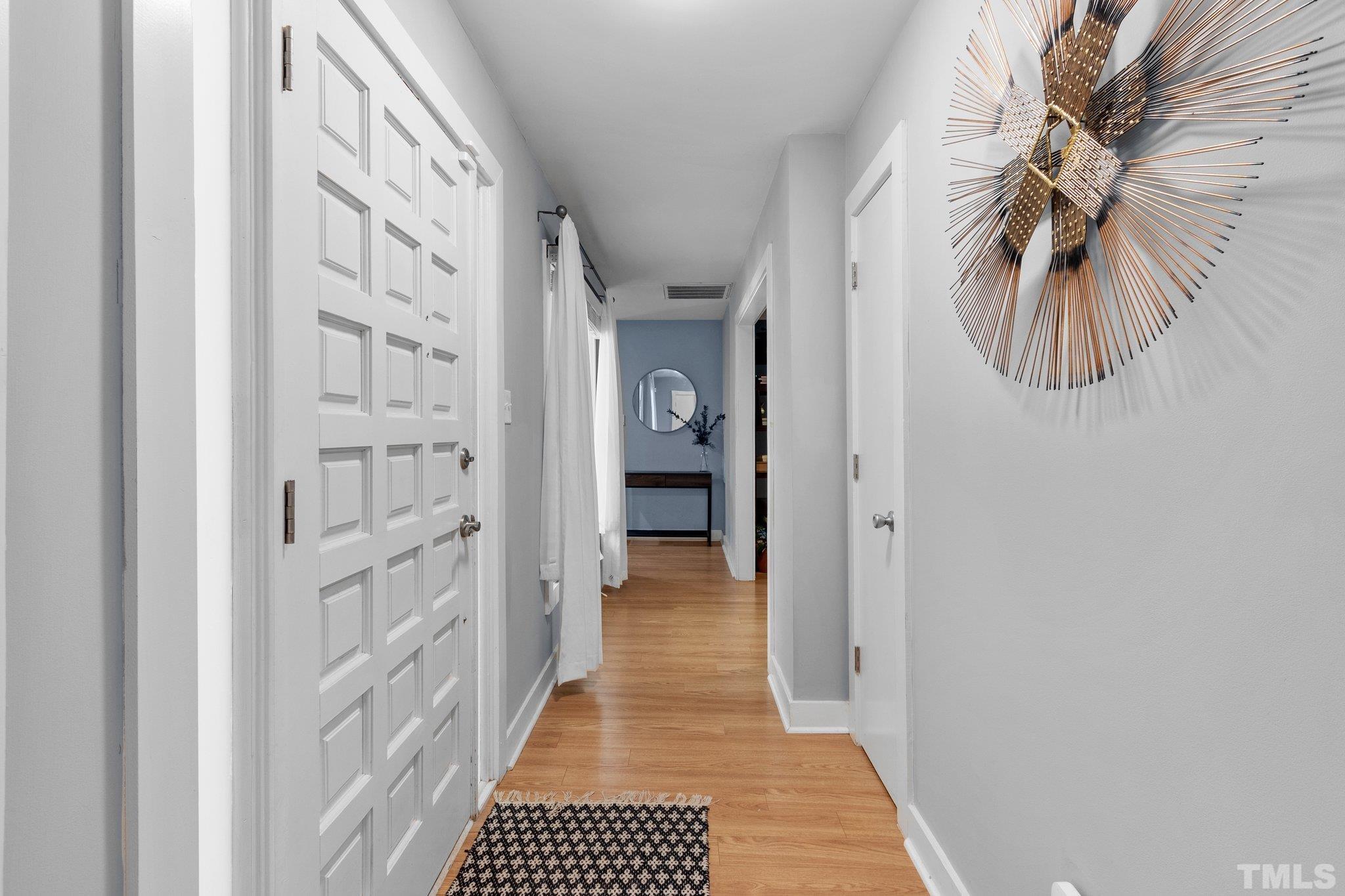 5 St James Court Durham, NC 27713 - Photo 5 of 44 a view of a hallway with closet and a window