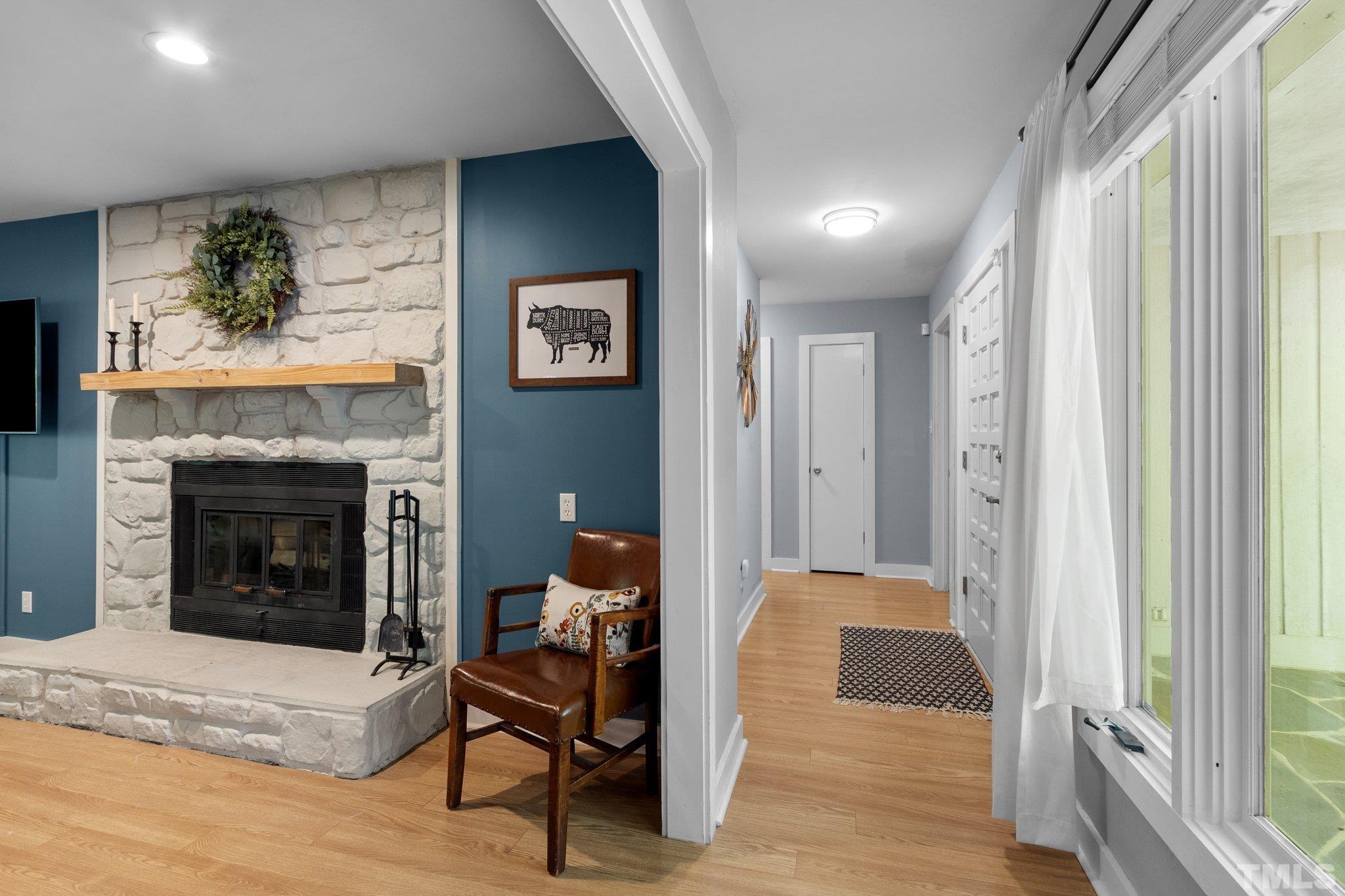 5 St James Court Durham, NC 27713 - Photo 6 of 44 a living room with furniture and a fireplace