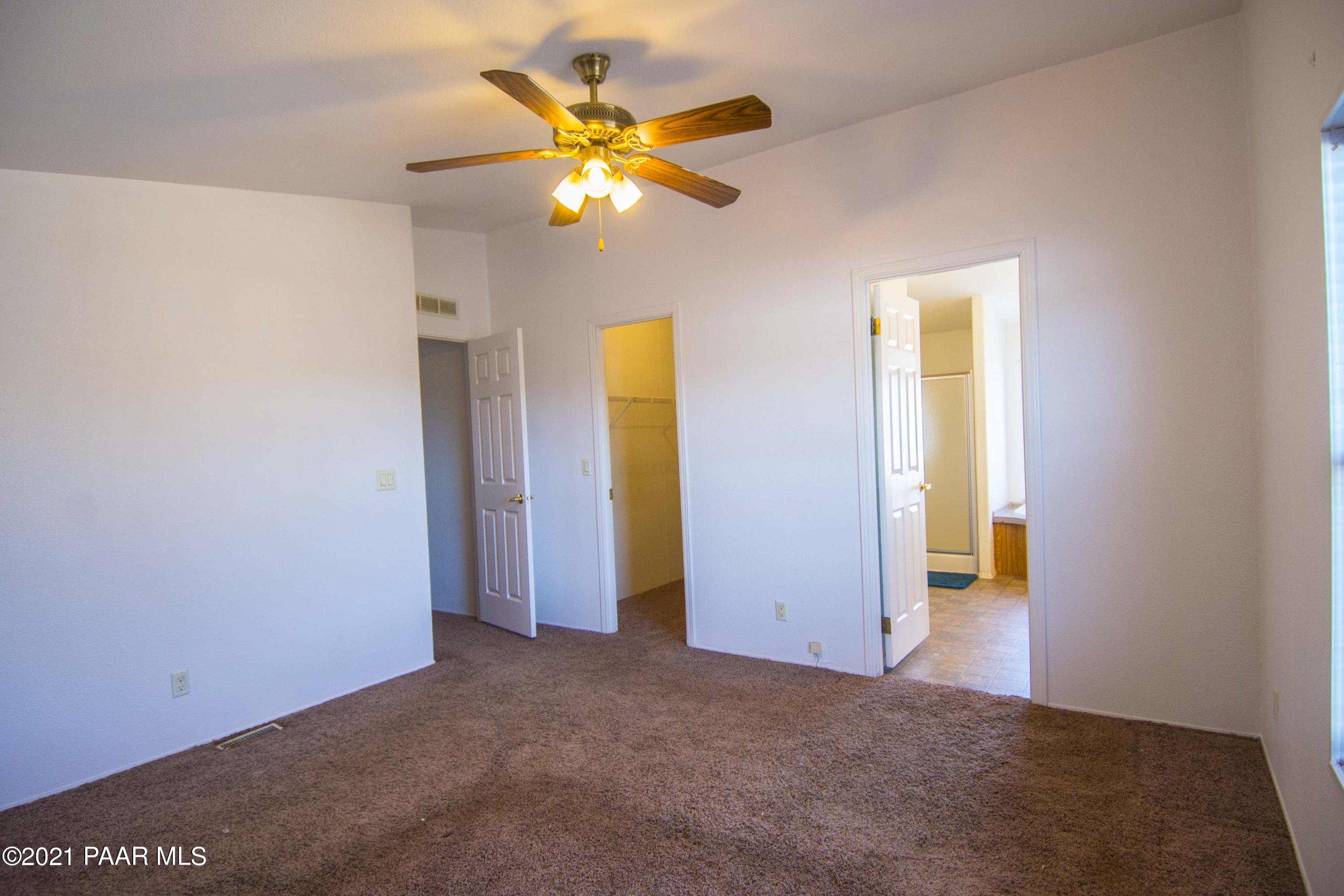 4650 Quail Hollow Road Rimrock, AZ 86335 - Photo 15 of 36 a view of an empty room with a window