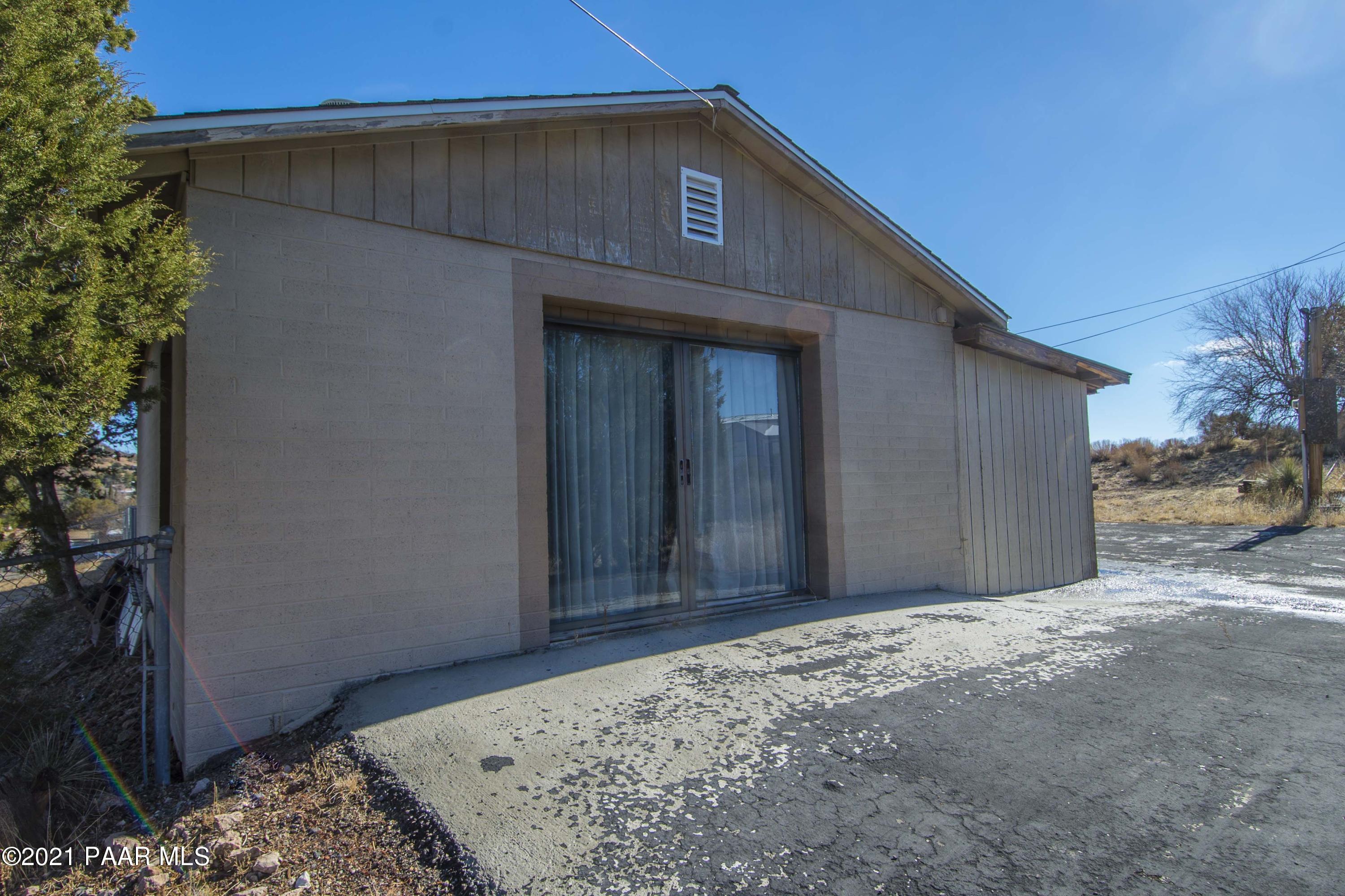 4650 Quail Hollow Road Rimrock, AZ 86335 - Photo 25 of 36 a front view of a house with a yard