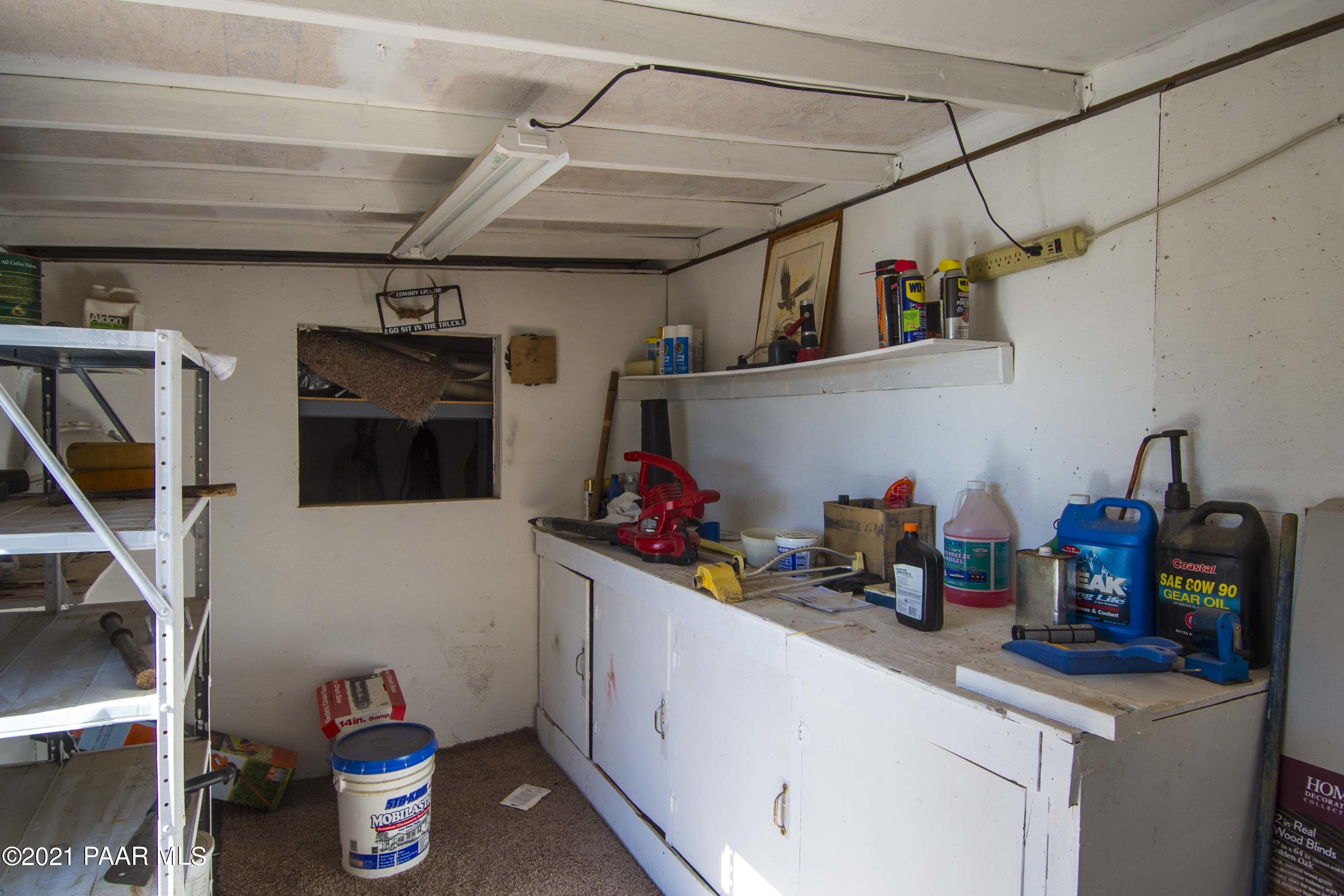 4650 Quail Hollow Road Rimrock, AZ 86335 - Photo 29 of 36 a utility room with sink dryer and washer