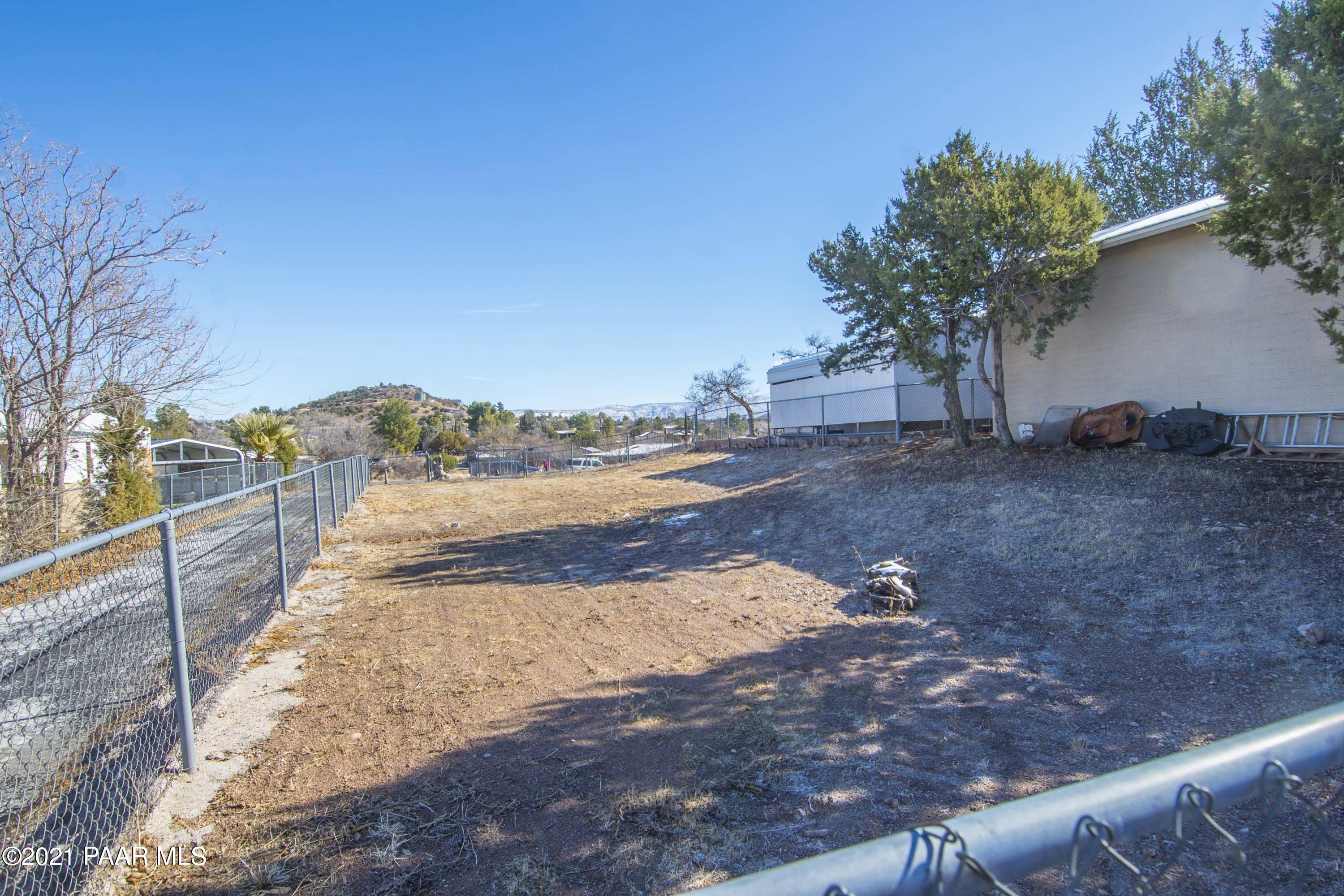 4650 Quail Hollow Road Rimrock, AZ 86335 - Photo 34 of 36 a view of a yard with plants and trees