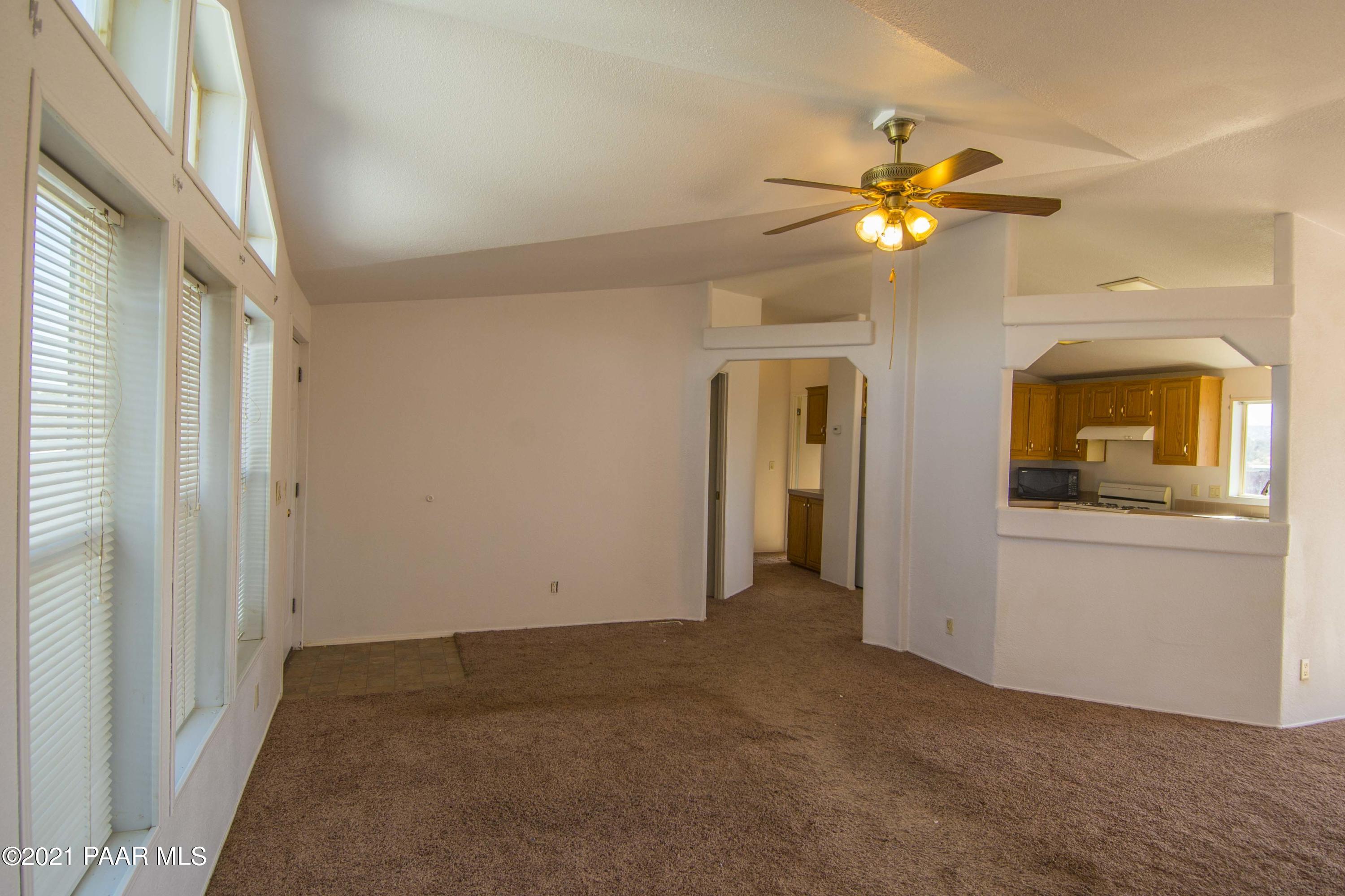 4650 Quail Hollow Road Rimrock, AZ 86335 - Photo 10 of 36 a view of an empty room with a window
