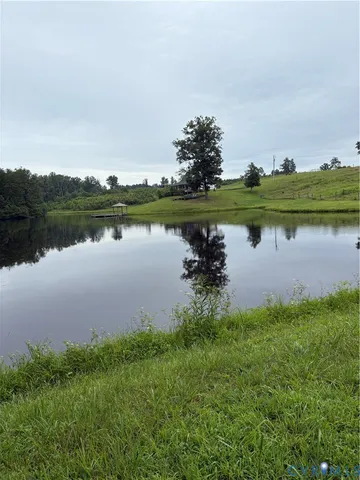 a view of a golf course with a lake