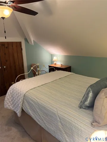 a view of living room with furniture and flat screen tv