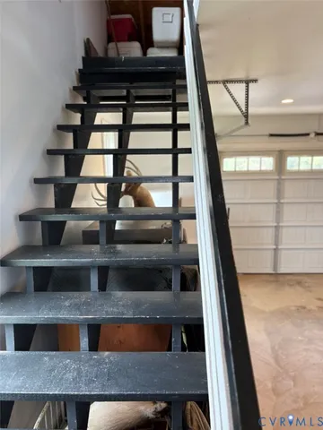 a view of a patio with table and chairs