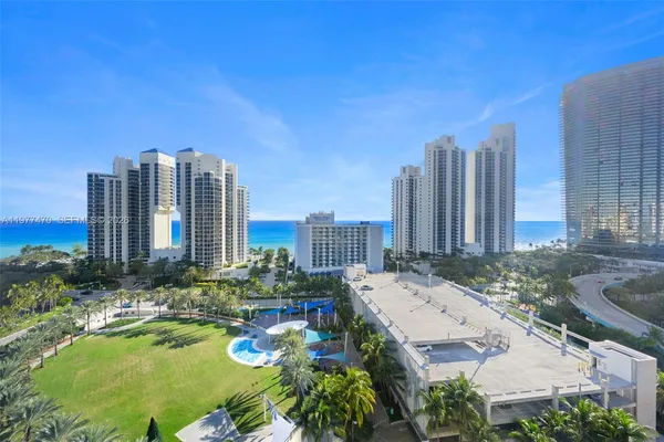 a view of a city with tall buildings