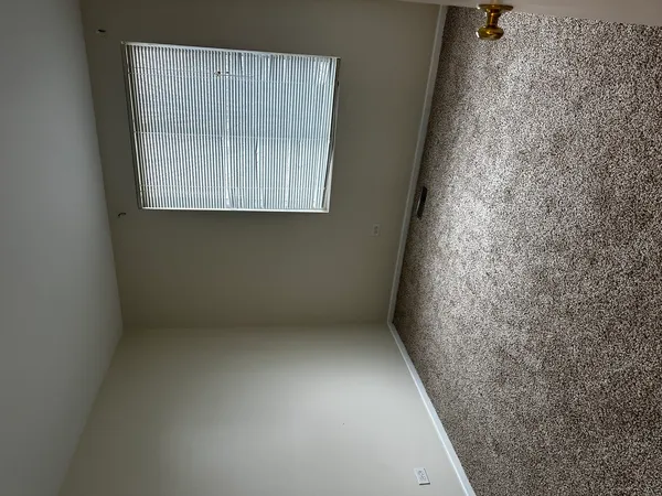 a view of hallway with shower