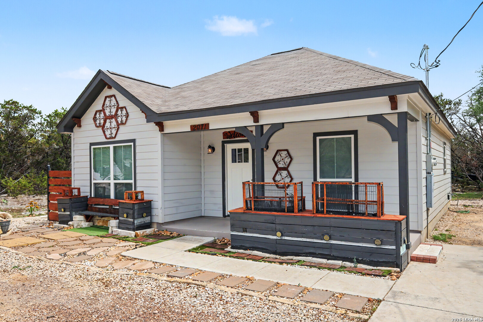 a view of a house with a outdoor seating space