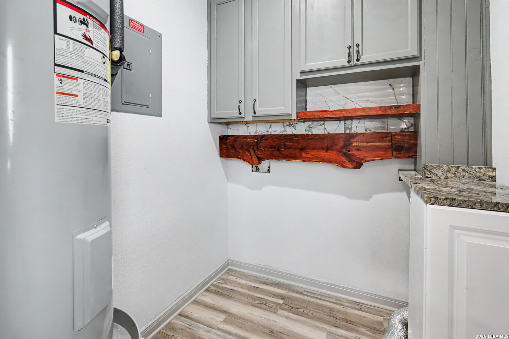 2071 Hornsby Spring Branch, TX 78070 - Photo 13 of 20 a bathroom with a sink and cabinets