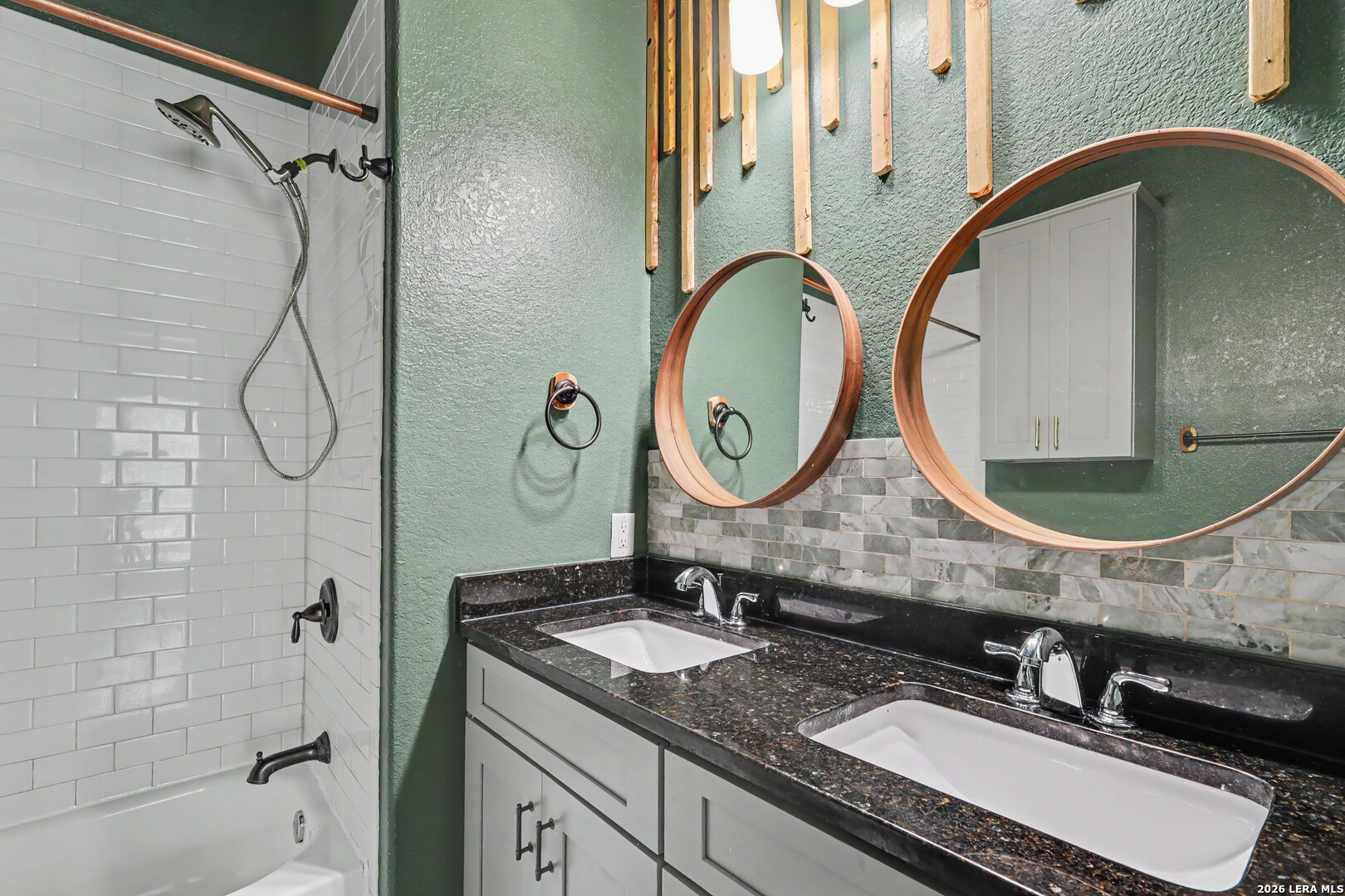 2071 Hornsby Spring Branch, TX 78070 - Photo 18 of 20 a bathroom with a granite countertop double vanity sink mirror and shower