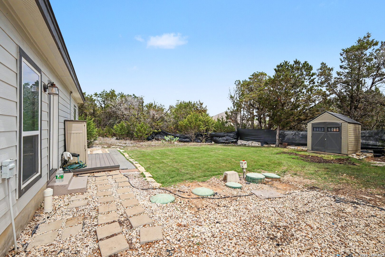 2071 Hornsby Spring Branch, TX 78070 - Photo 19 of 20 a view of a house with a yard