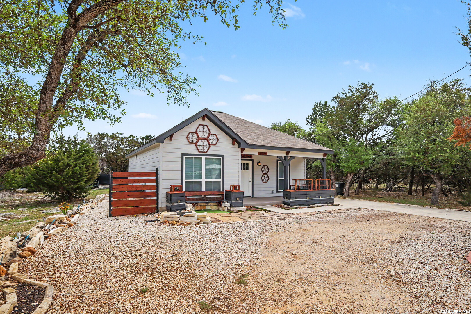 2071 Hornsby Spring Branch, TX 78070 - Photo 2 of 20 a front view of a house with a yard