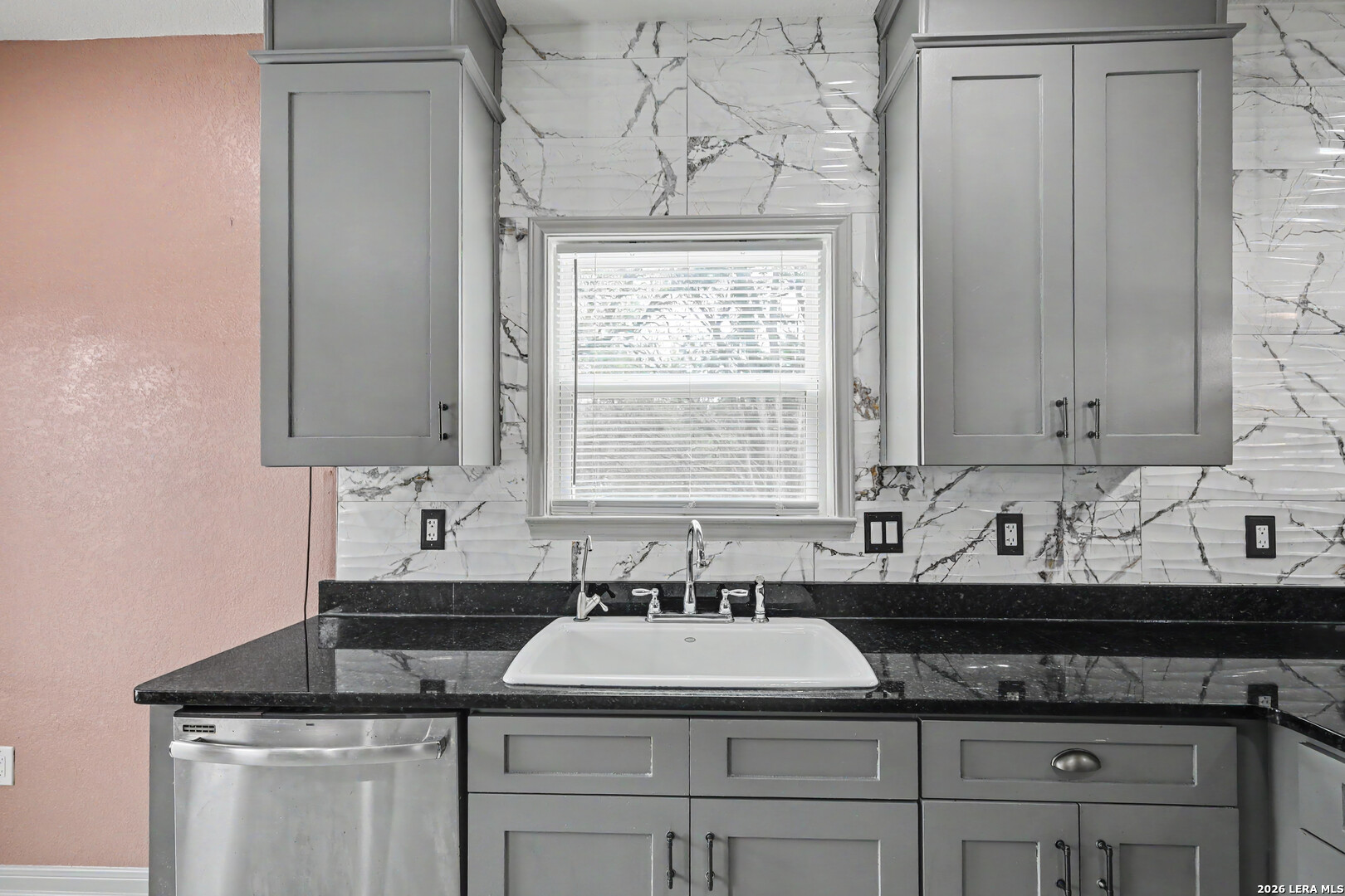 2071 Hornsby Spring Branch, TX 78070 - Photo 10 of 20 a bathroom with a sink and a mirror
