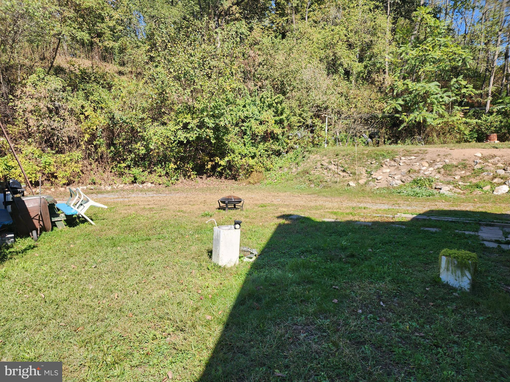 13214 Oldtown Road Southeast Cumberland, MD 21502 - Photo 11 of 15 a view of a lake with a yard