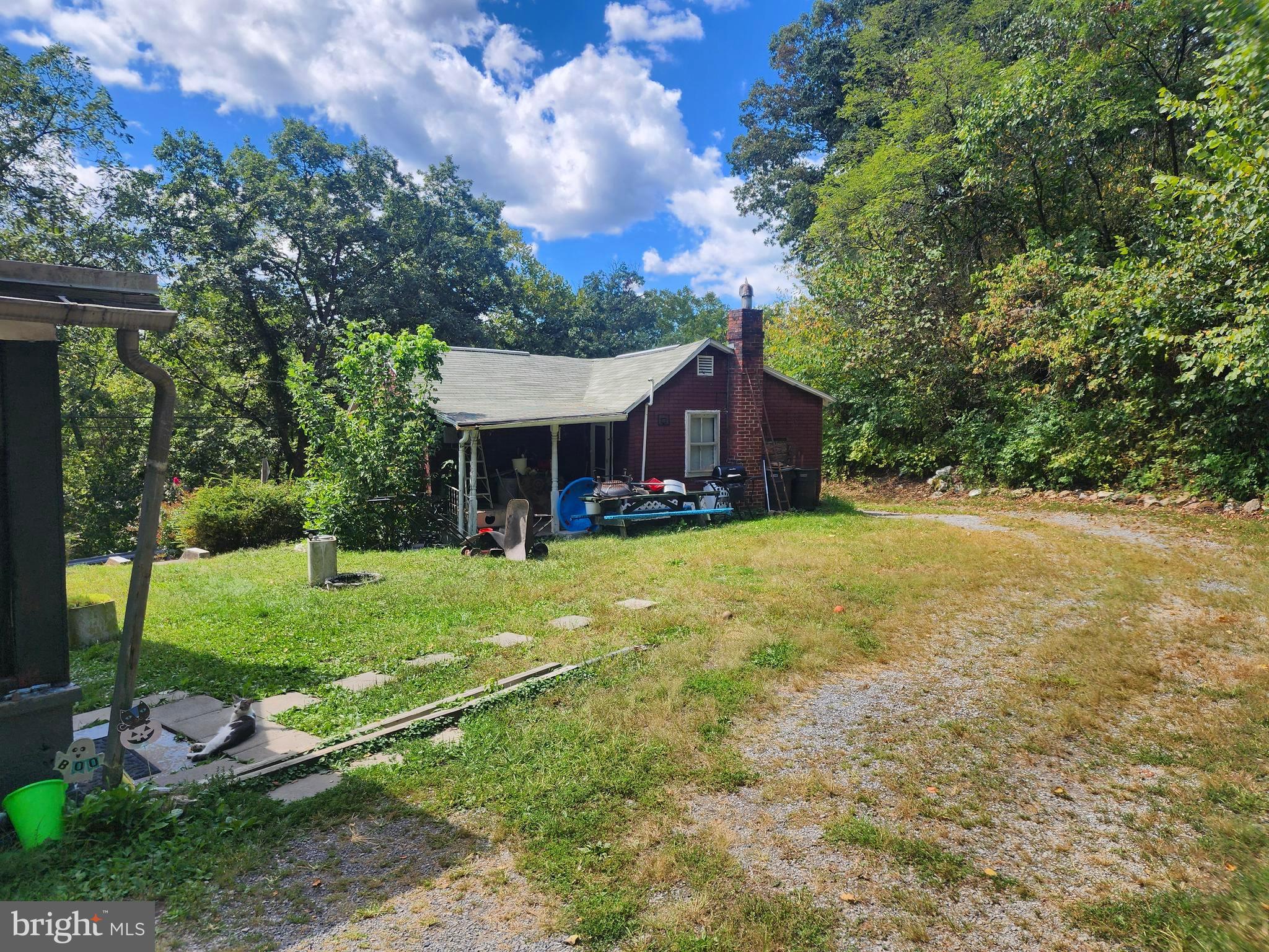 13214 Oldtown Road Southeast Cumberland, MD 21502 - Photo 9 of 15 a view of a house with backyard and a tree